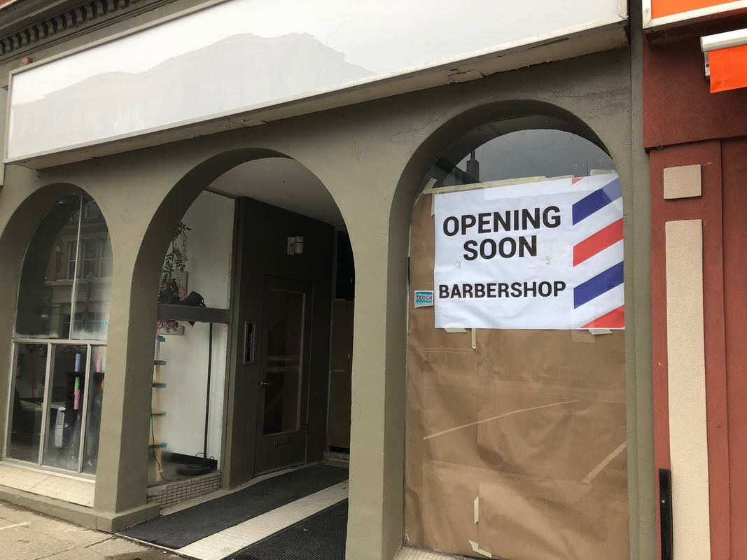 new barbershop opening in Woodstock