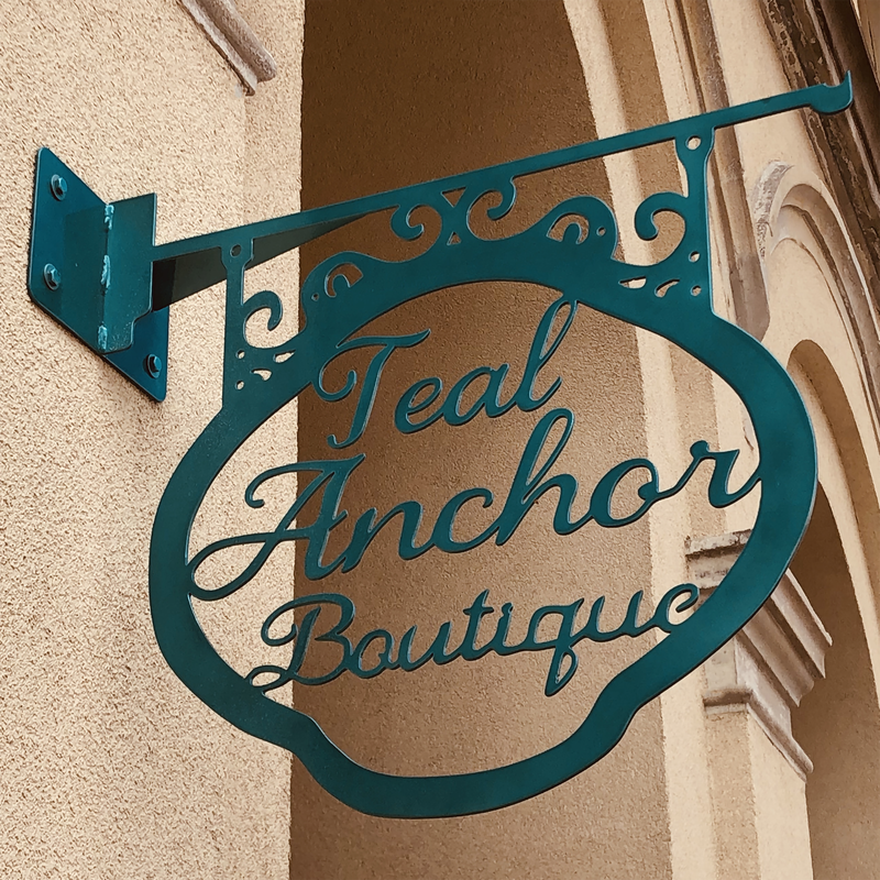 teal anchor boutique signage - original image
